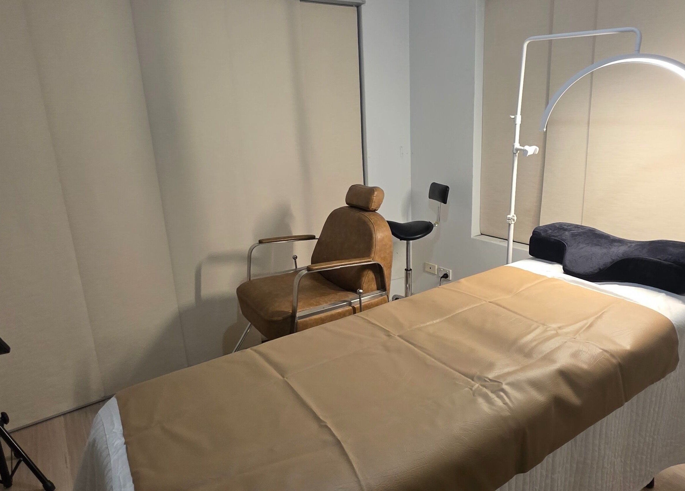 Serene treatment room at Doin Just Fine - Fine Line Tattoo in Bentley, Western Australia, AU.