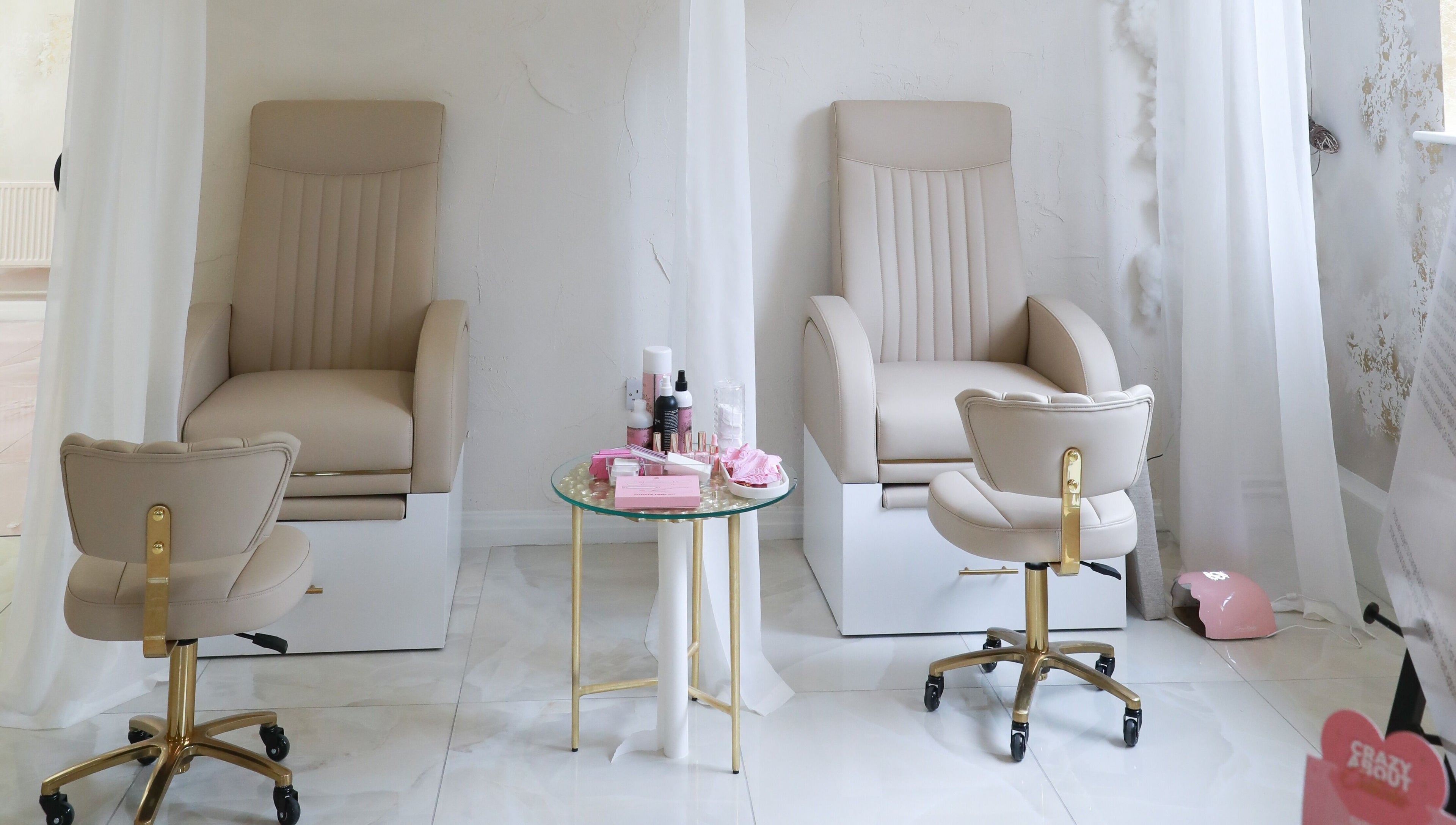 Elegant nail salon chairs at Glitterbels Salon Nails by Annabel in Newcastle-under-Lyme, England, GB.