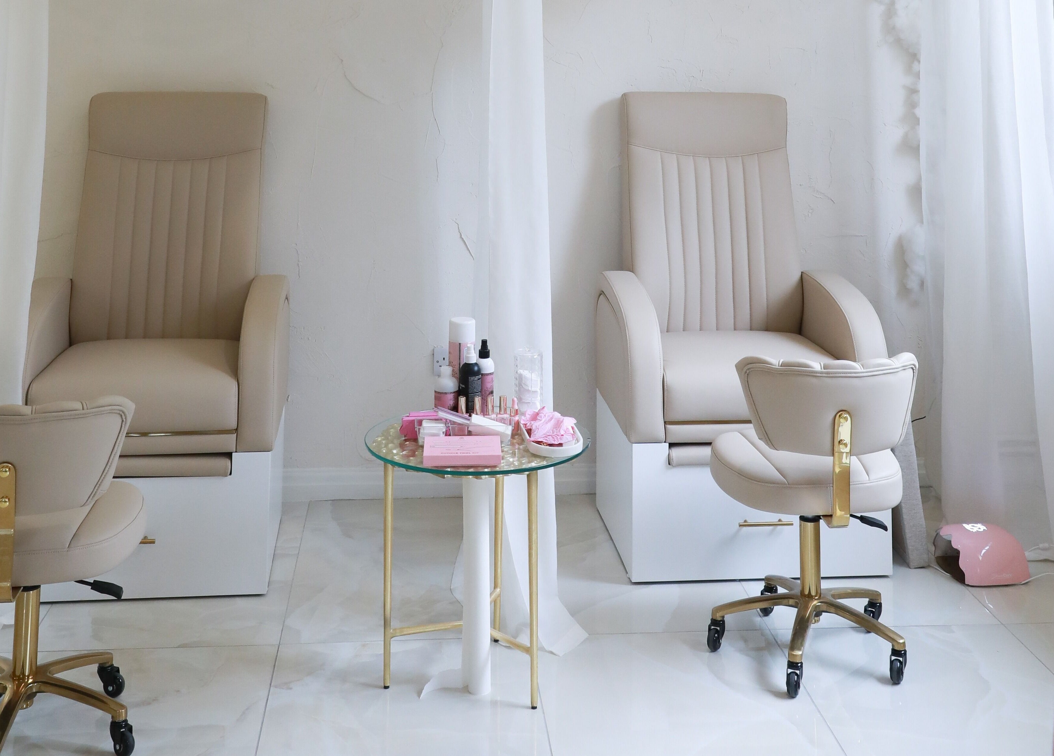 Elegant nail salon chairs at Glitterbels Salon Nails by Annabel in Newcastle-under-Lyme, England, GB.