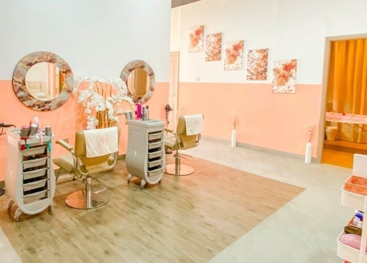 Am Grace & Glam Beauty Center Arjan Dubai features chic salon chairs and mirrors in pastel decor, Dubai, AE.