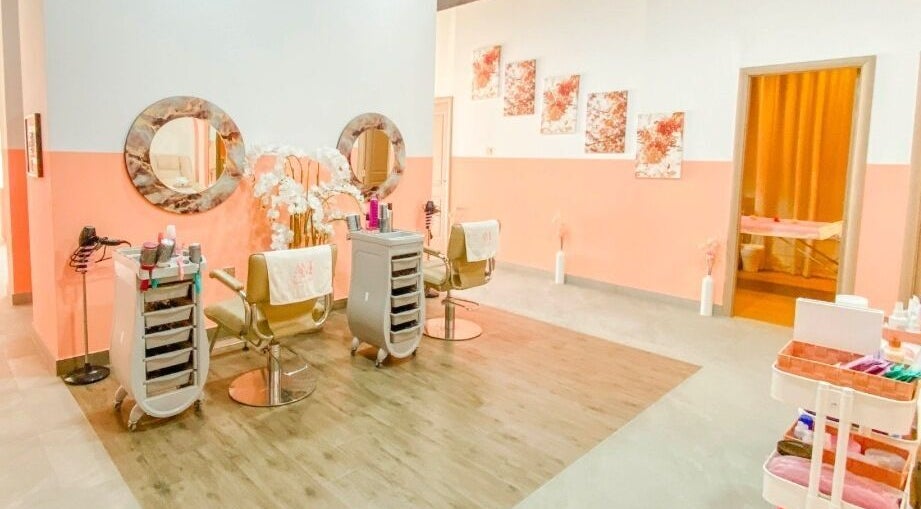 Am Grace & Glam Beauty Center Arjan Dubai features chic salon chairs and mirrors in pastel decor, Dubai, AE.