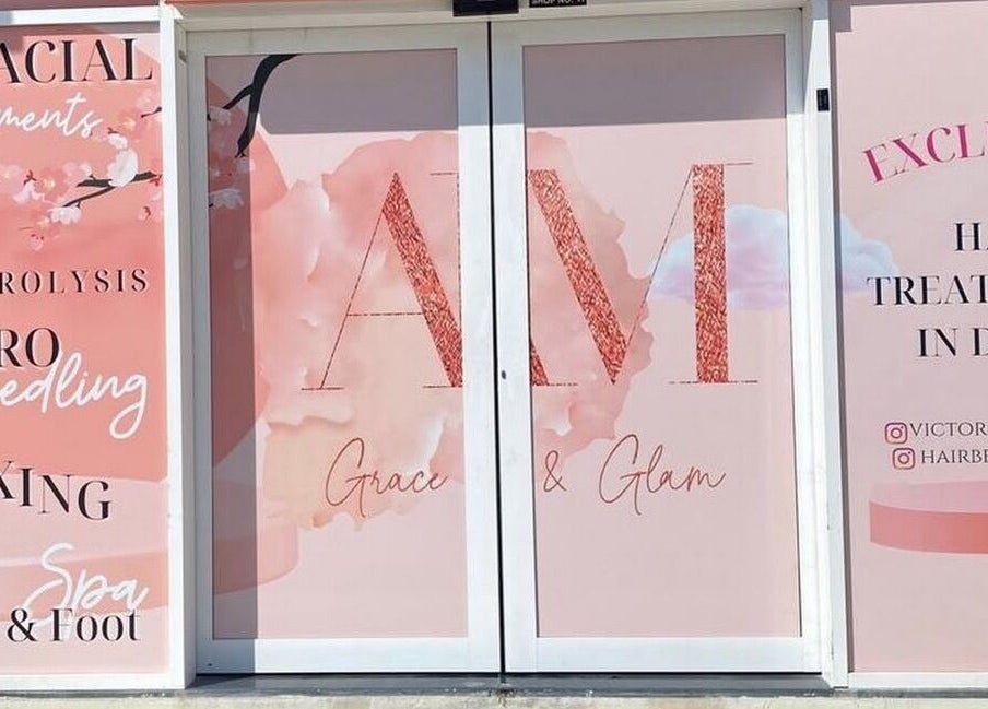 Entrance of Am Grace & Glam Beauty Center Arjan Dubai, showcasing vibrant service offerings in Dubai, AE.