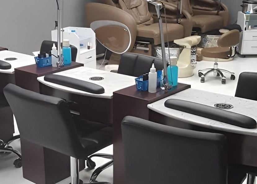 Elegant nail stations at The Walk-In Salon, Elkhart, Indiana, US, featuring modern design and comfort.