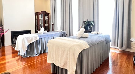 Relaxing massage room at MRB Massage Therapy, Melbourne, Victoria, AU, showcasing two inviting therapy tables.
