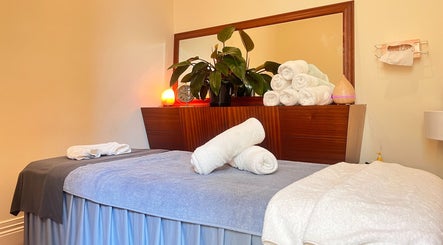 Massage room at MRB Massage Therapy, Melbourne, Victoria, AU with towels and calming ambiance.