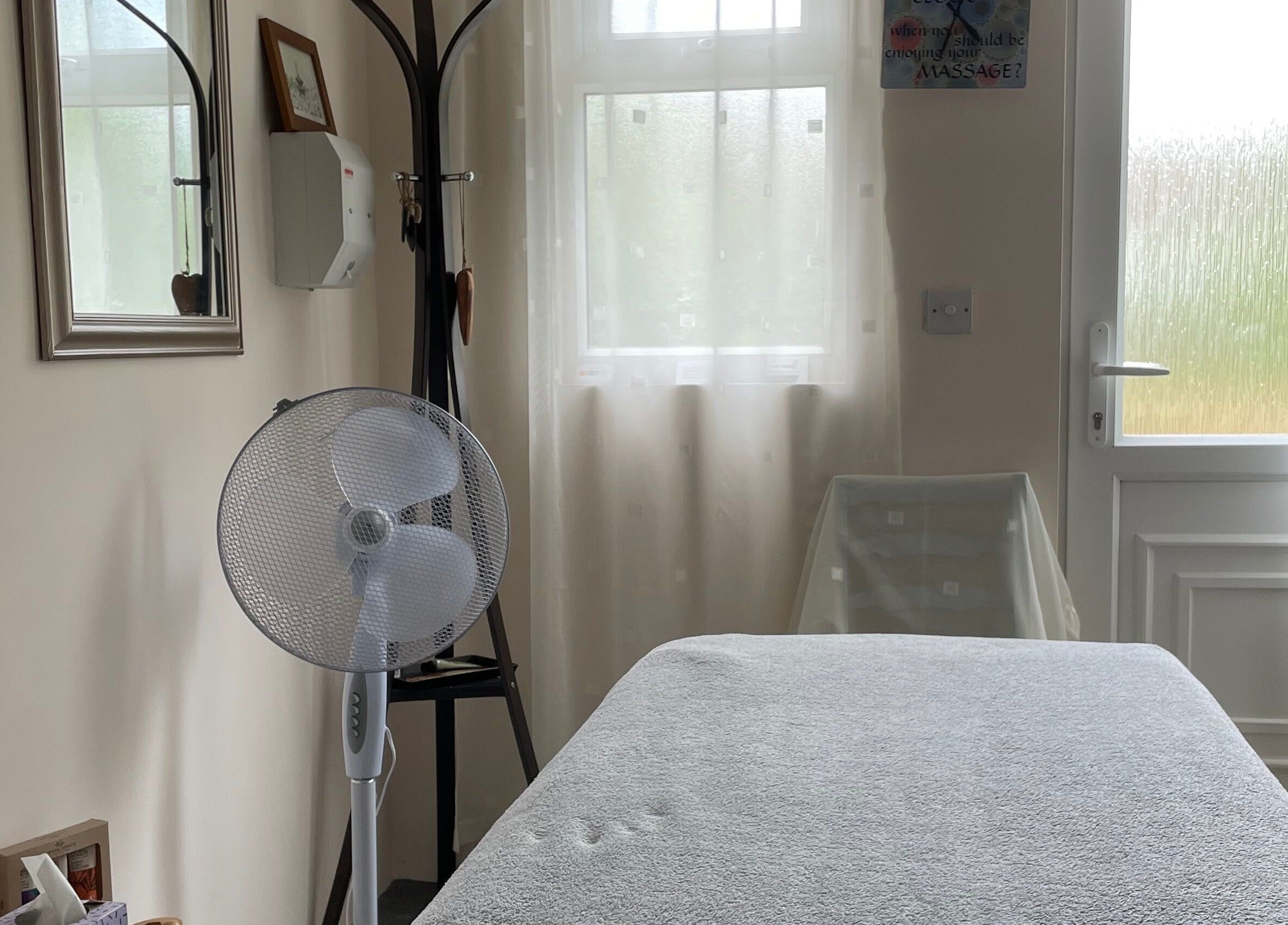 Treatment room at Farnborough ART of Healing, featuring massage table and calming decor in Farnborough, England, GB.