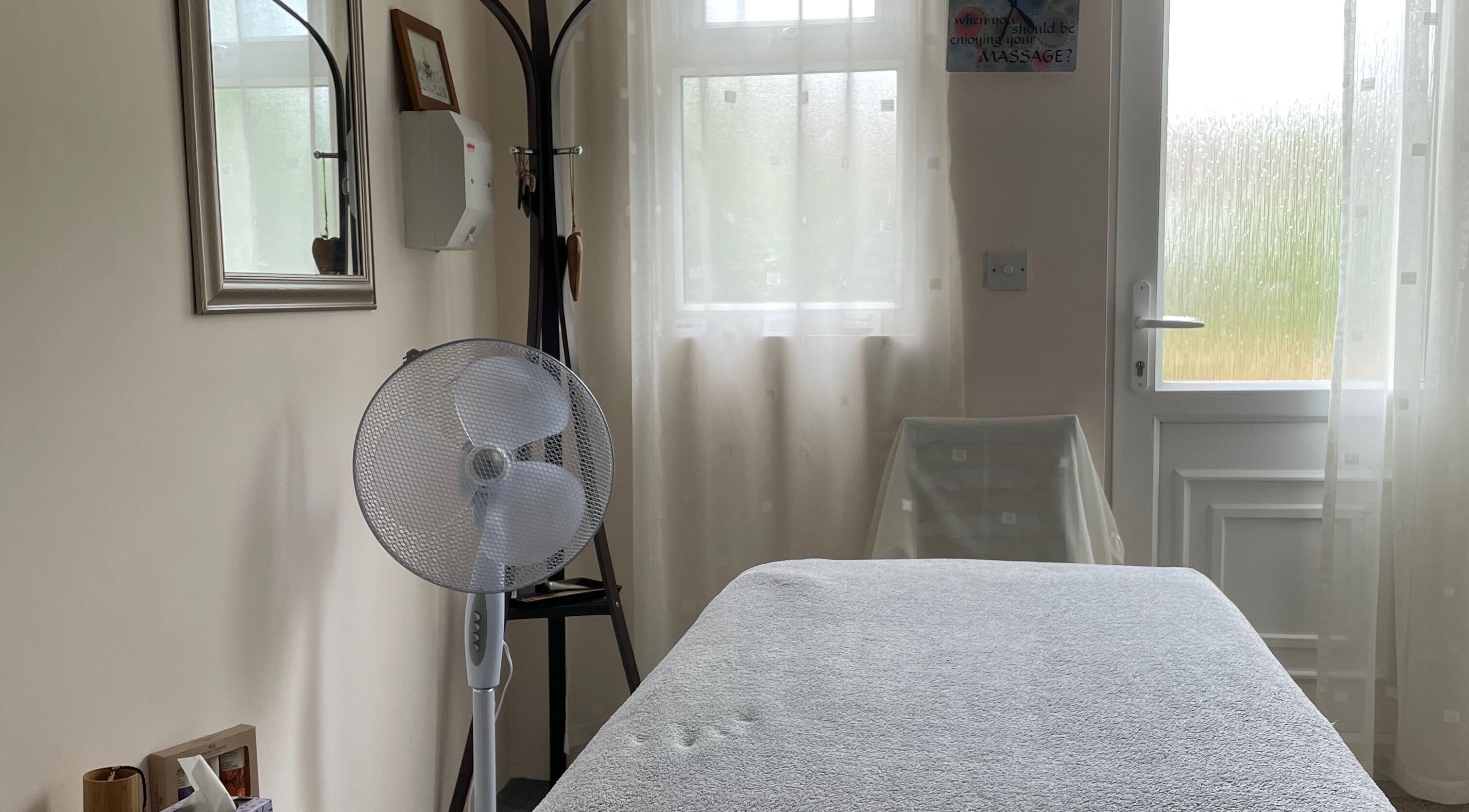 Treatment room at Farnborough ART of Healing, featuring massage table and calming decor in Farnborough, England, GB.