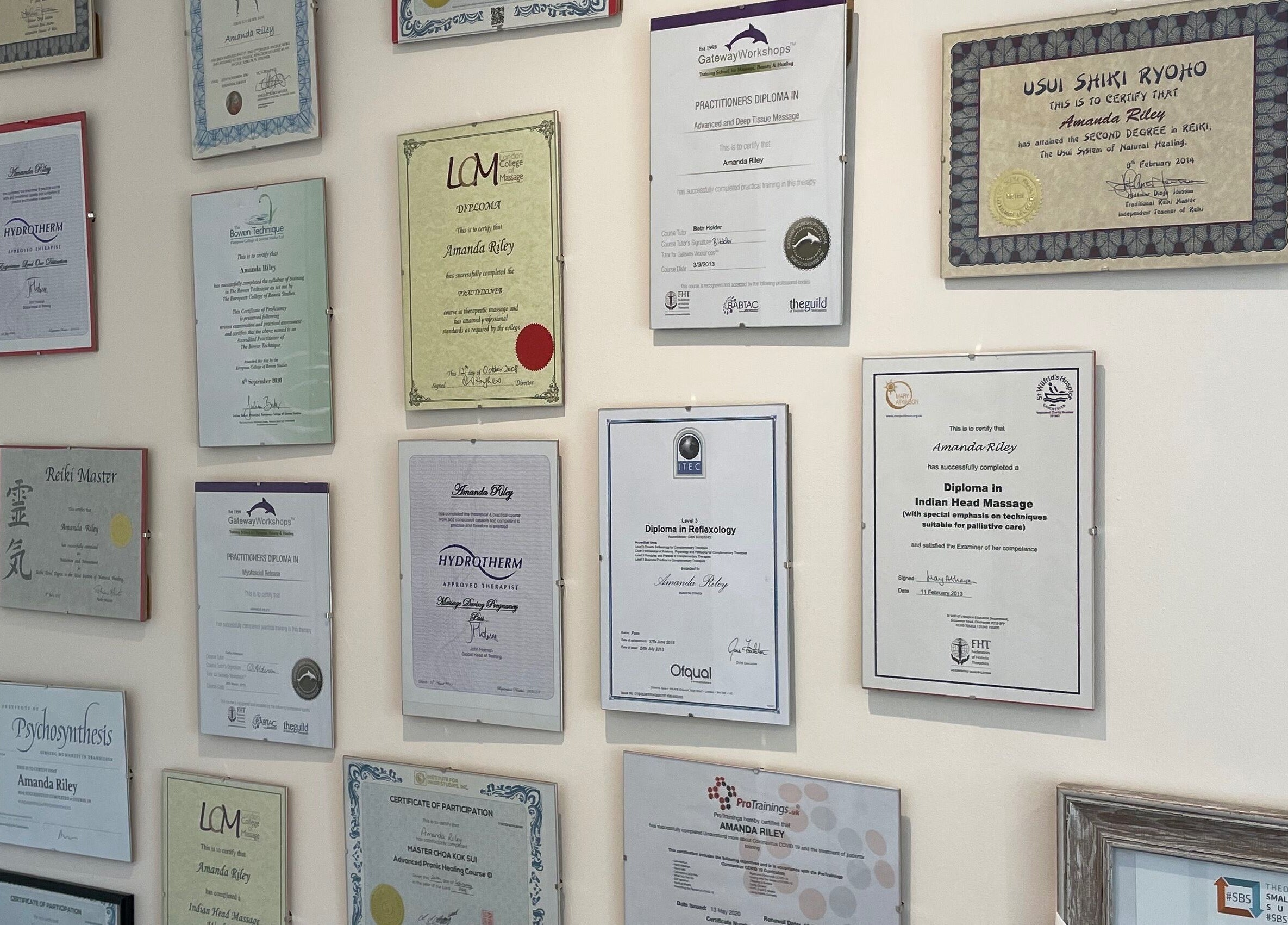 Farnborough ART of Healing's certificate wall showcasing various professional accreditations in Farnborough, England, GB.