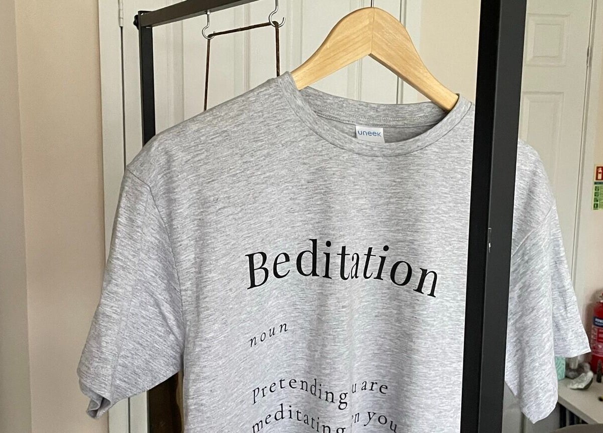 Grey shirt with 'Beditation' text at Farnborough ART of Healing, Farnborough, England, GB.