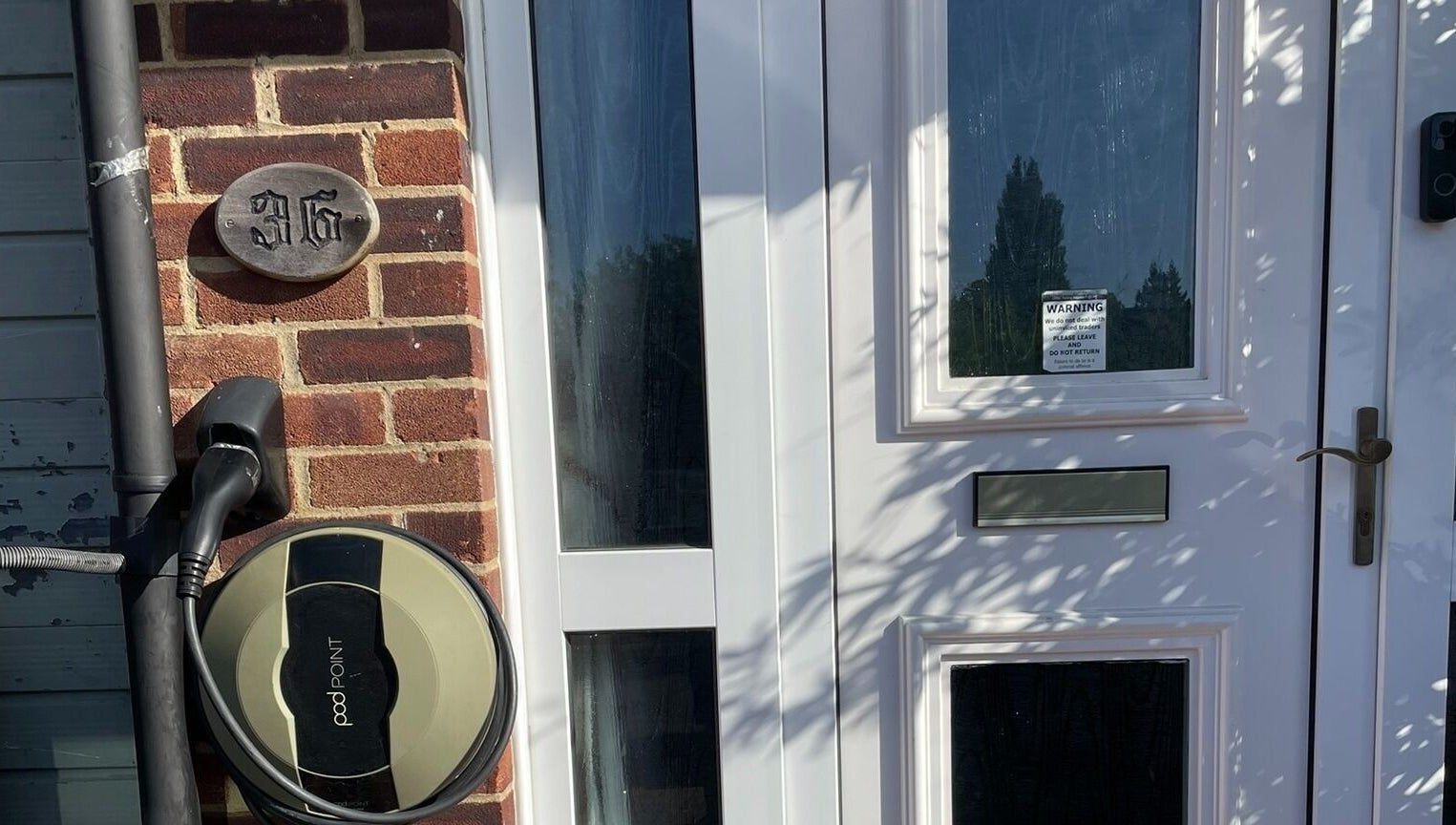 Front entrance of Ascot ART of Healing, Winkfield Row, England showcasing elegant brickwork and door.