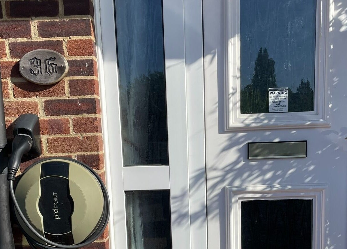 Front entrance of Ascot ART of Healing, Winkfield Row, England showcasing elegant brickwork and door.