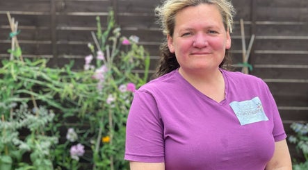 Person in purple shirt at Ascot ART of Healing garden, Winkfield Row, England, GB.