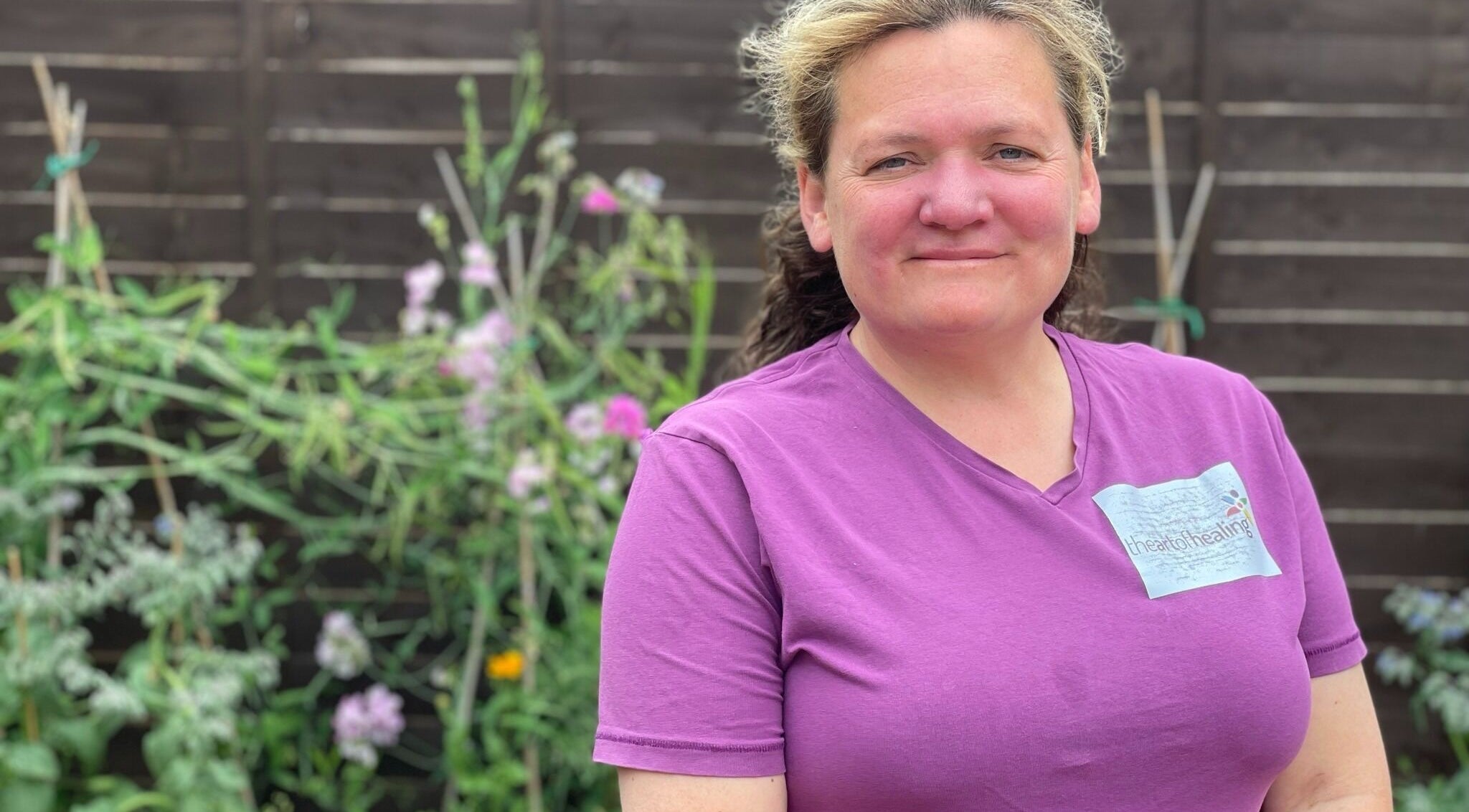 Person in purple shirt at Ascot ART of Healing garden, Winkfield Row, England, GB.