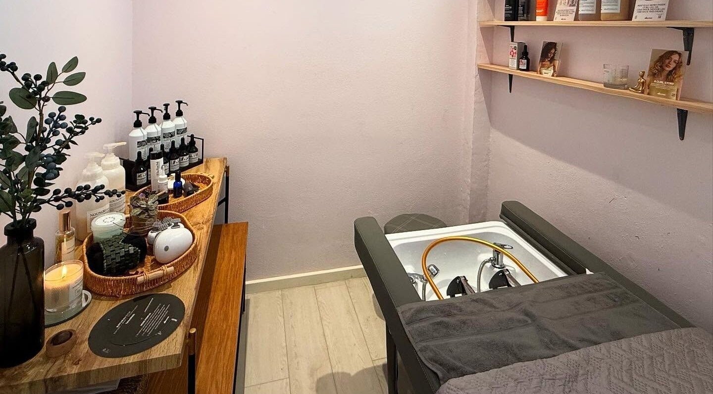 Relaxing spa room at La Maison Beauté by K, Moka, Moka District, MU, featuring hair wash station and products.