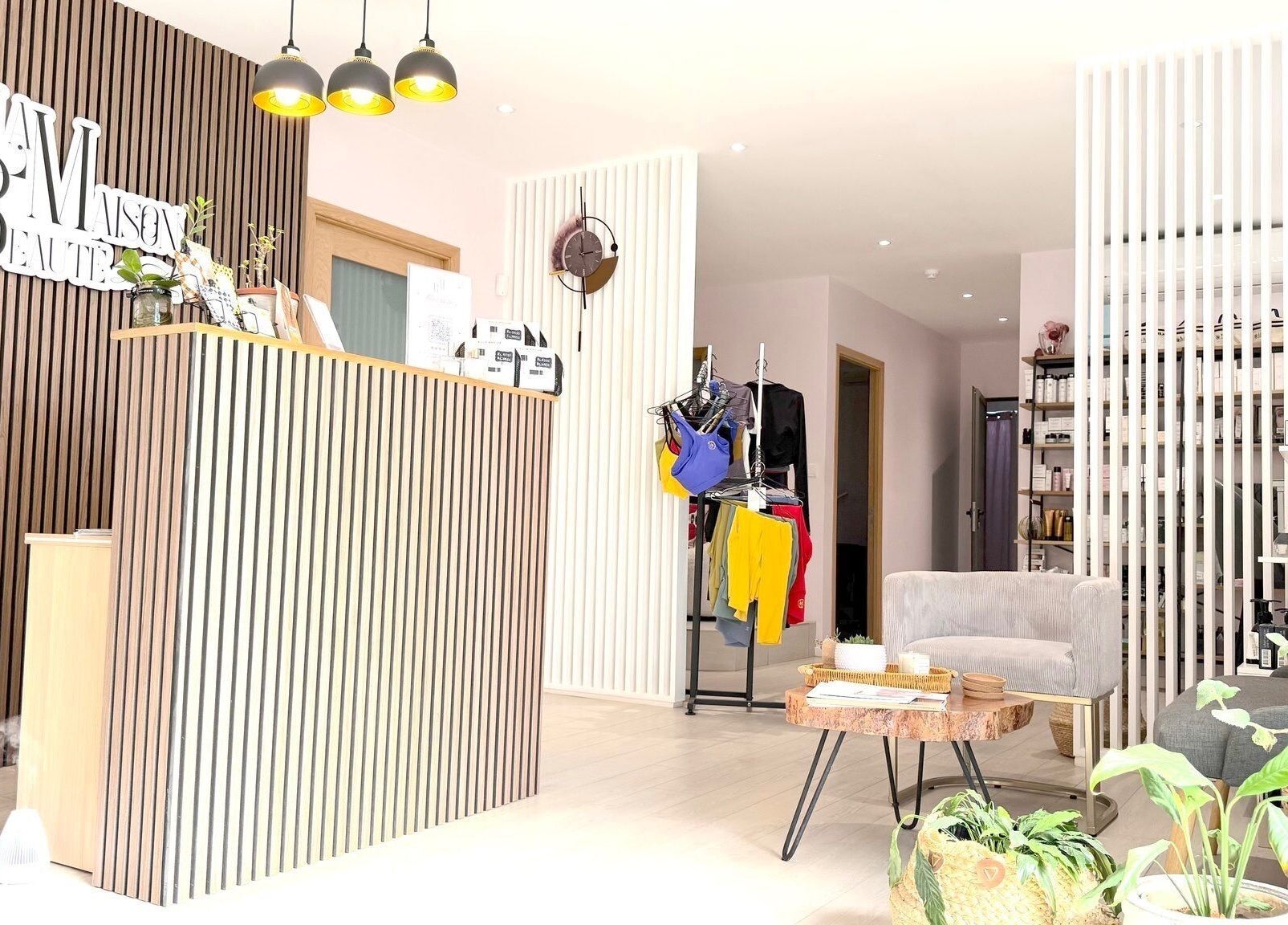 Chic reception area of La Maison Beauté by K in Moka, Moka District, MU, featuring modern decor and plants.