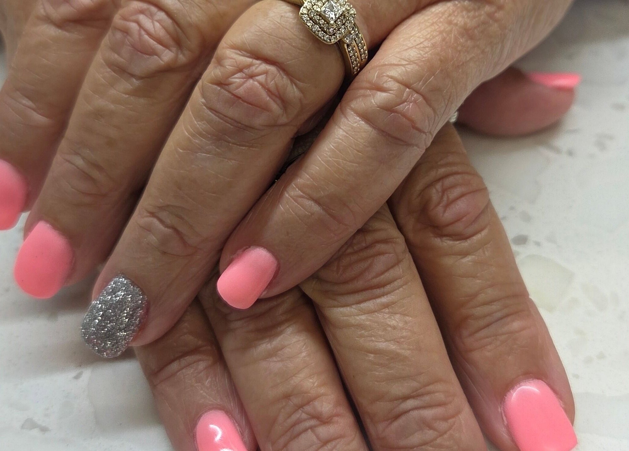 Elegant pink and silver manicure at Erica's Salon & Spa, Monterey, Tennessee, US.