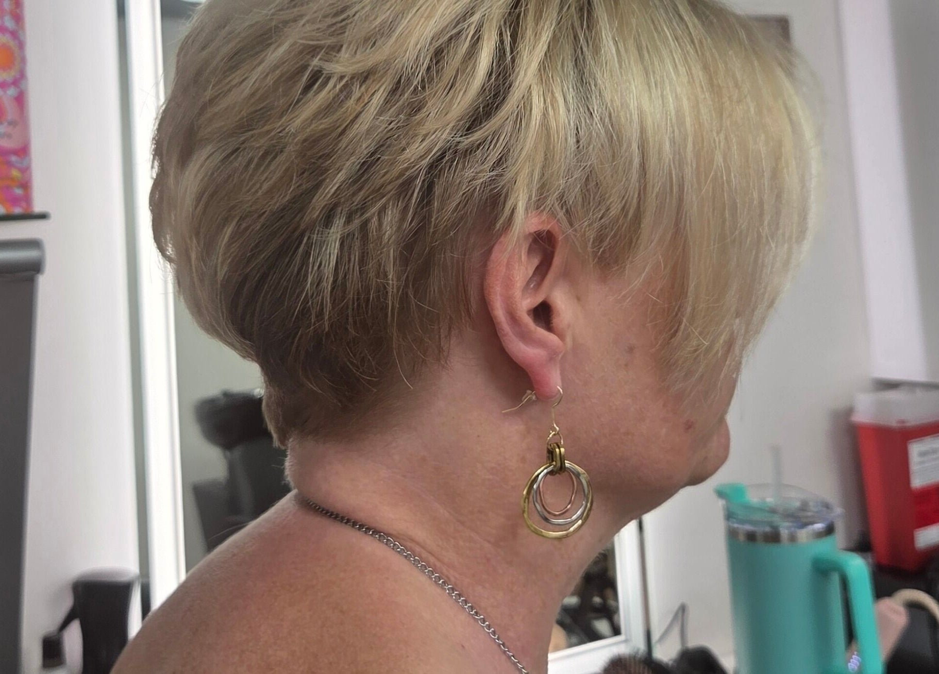 Side view of a chic haircut at Erica's Salon & Spa, Monterey, Tennessee, US, showcasing stylish layers.