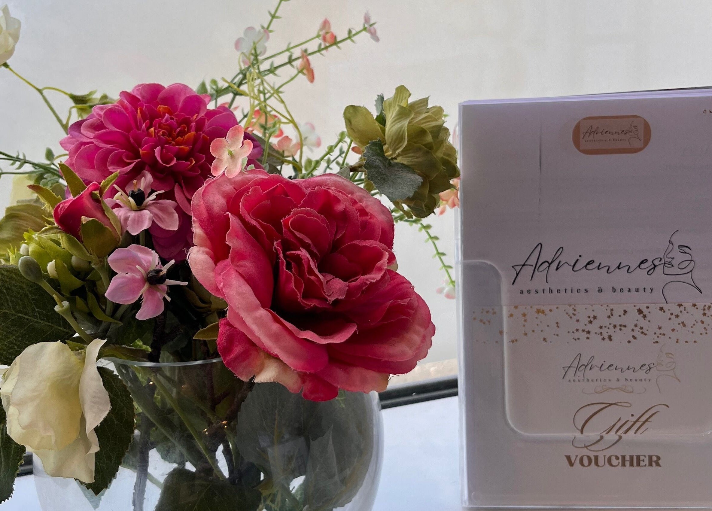 Elegant floral display and voucher at Adriennes Aesthetics Ltd, Clarkston, Scotland, GB.