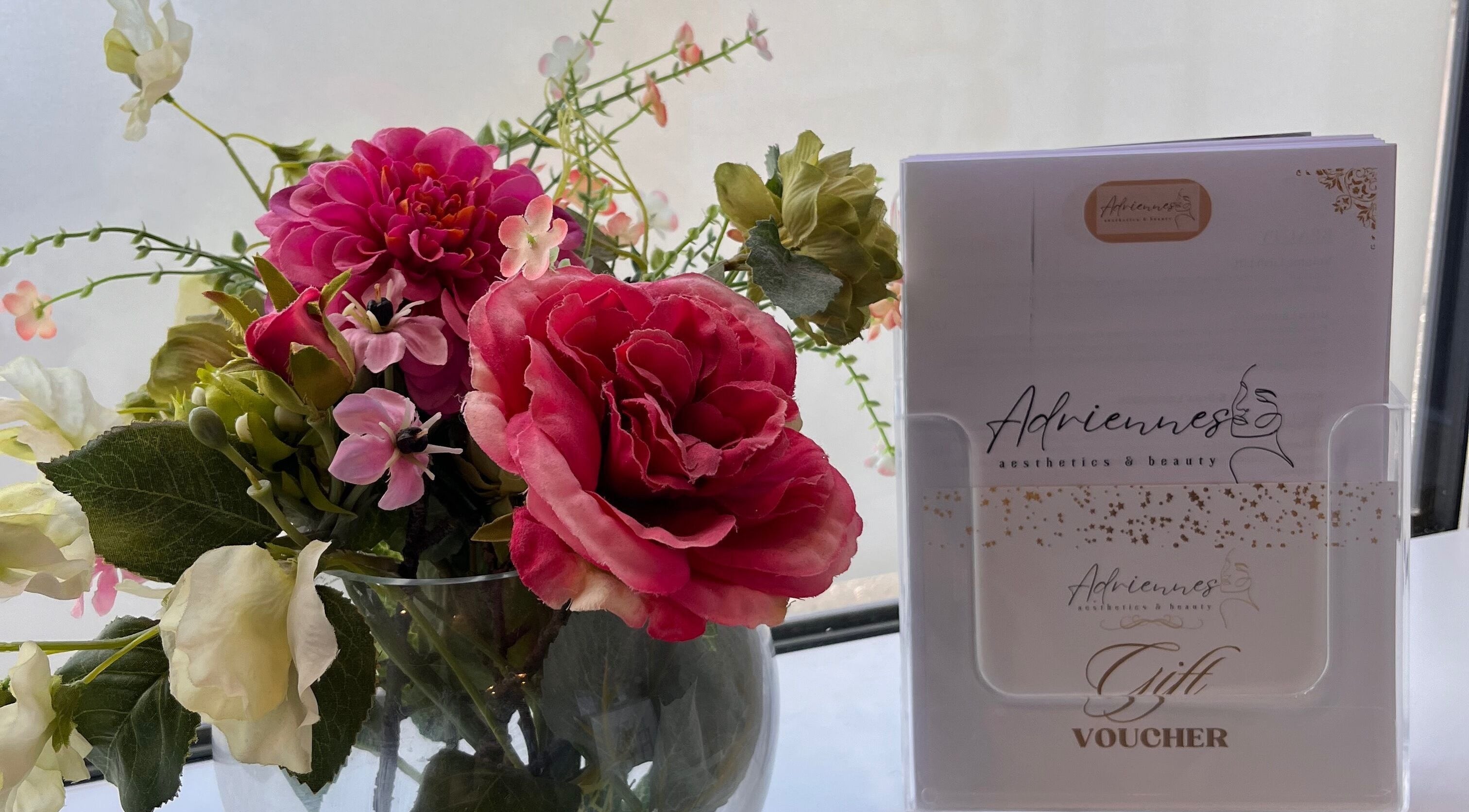 Elegant floral display and voucher at Adriennes Aesthetics Ltd, Clarkston, Scotland, GB.