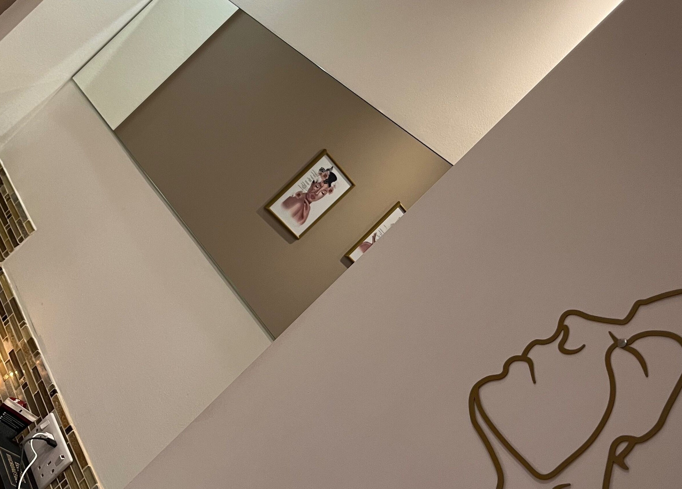 Modern wall art and vanity at Adriennes Aesthetics Ltd, Clarkston, Scotland, GB.