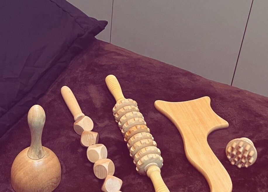 Massage tools on a table at Adriennes Aesthetics Ltd, Clarkston, Scotland, GB, offering wellness treatments.