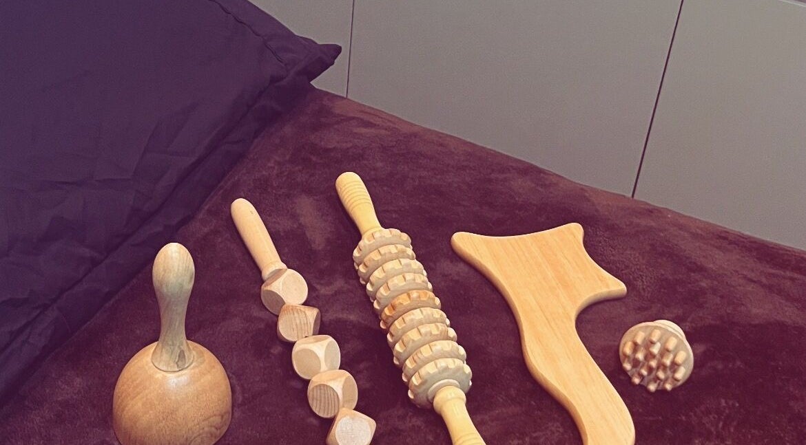 Massage tools on a table at Adriennes Aesthetics Ltd, Clarkston, Scotland, GB, offering wellness treatments.