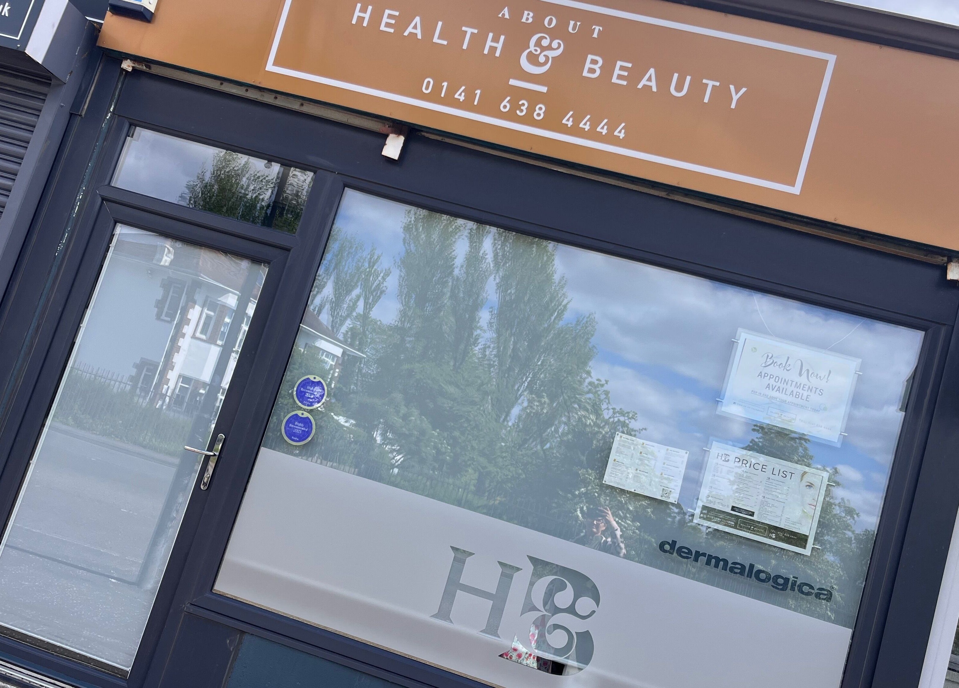 Front entrance of Adriennes Aesthetics Ltd, Clarkston, Scotland, GB, showcasing beauty services.