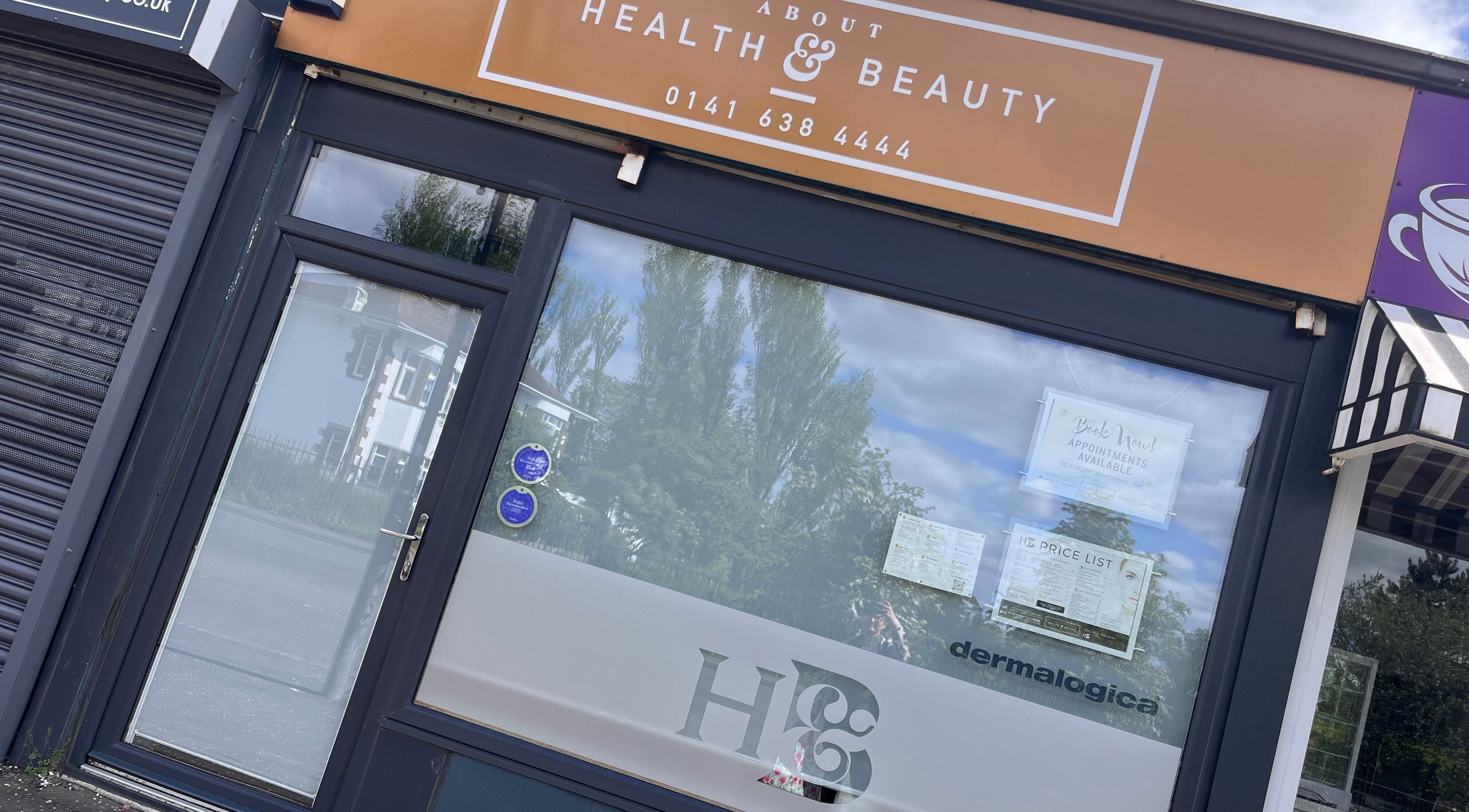 Front entrance of Adriennes Aesthetics Ltd, Clarkston, Scotland, GB, showcasing beauty services.