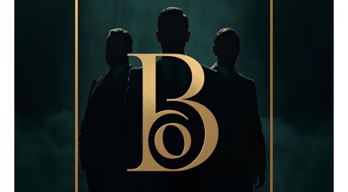 Stylish silhouettes behind golden B logo at BLACK OAK, Peoria, Illinois, US.