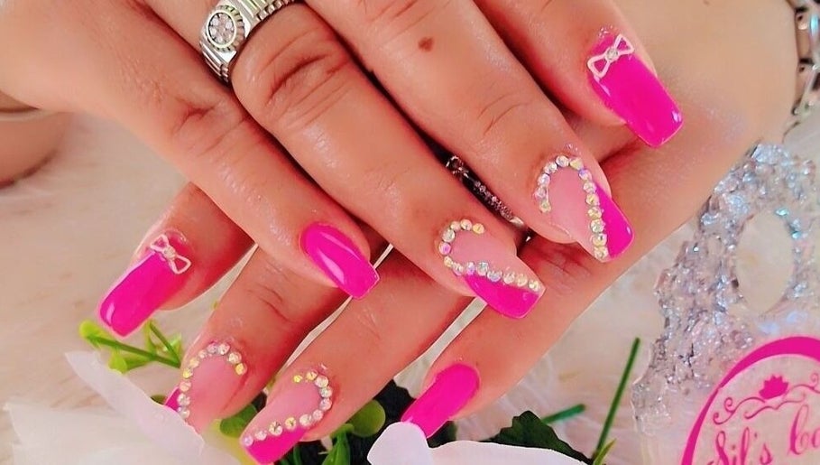 Elegant pink nail art with rhinestones at Sils Care For You, Kralendijk, Bonaire, BQ.