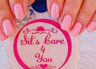 Manicured nails with pink polish at Sils Care For You, Kralendijk, Bonaire, BQ.