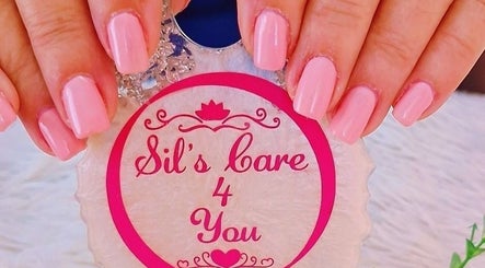 Manicured nails with pink polish at Sils Care For You, Kralendijk, Bonaire, BQ.
