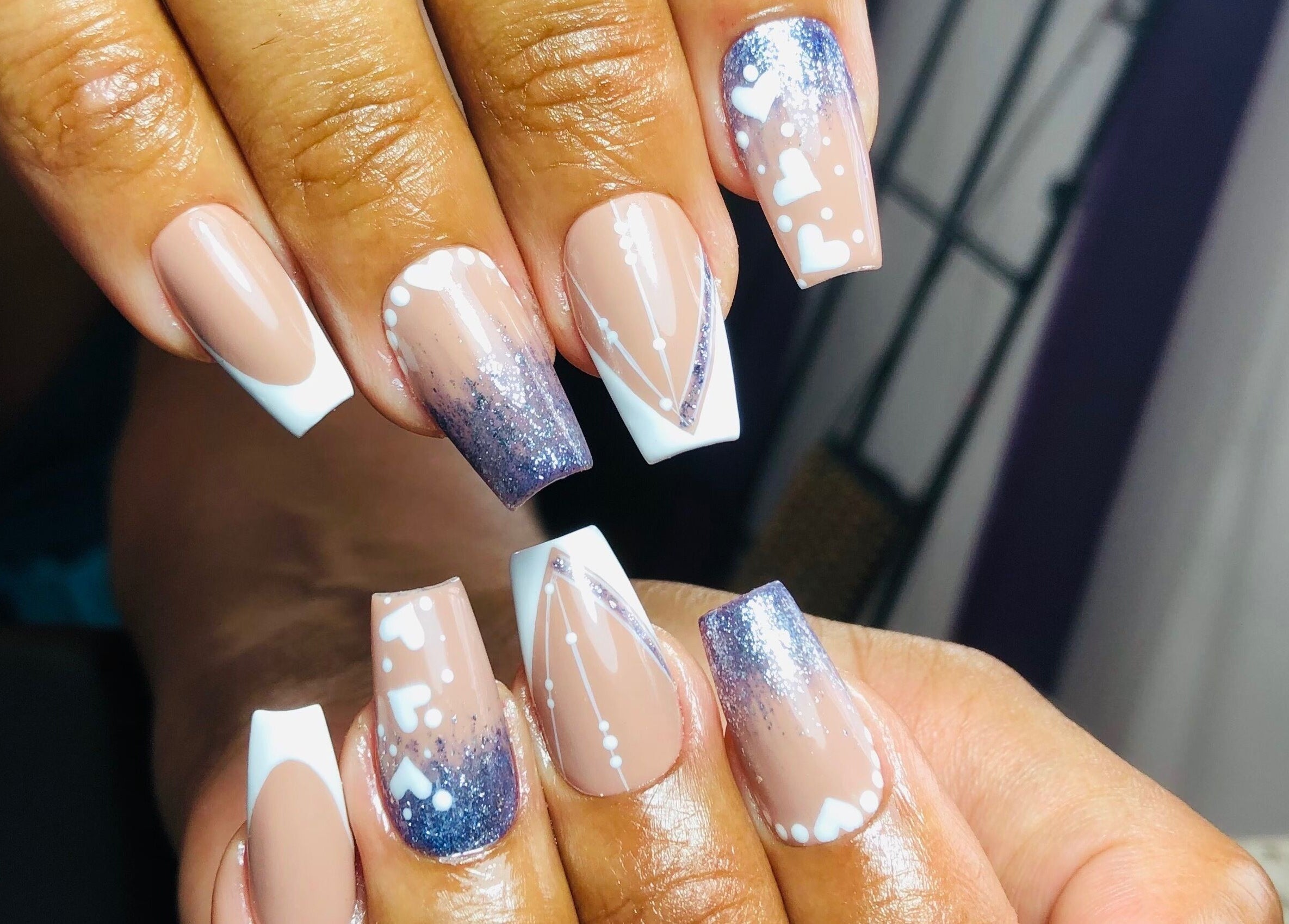 Elegant nail art at The Butterfly Nail Lounge, Bridgetown, Saint Peter, BB.