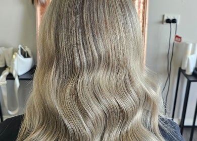 Elegant blonde waves styled at Tease by Jess, Mildura, Victoria, AU, showcasing professional hair care.