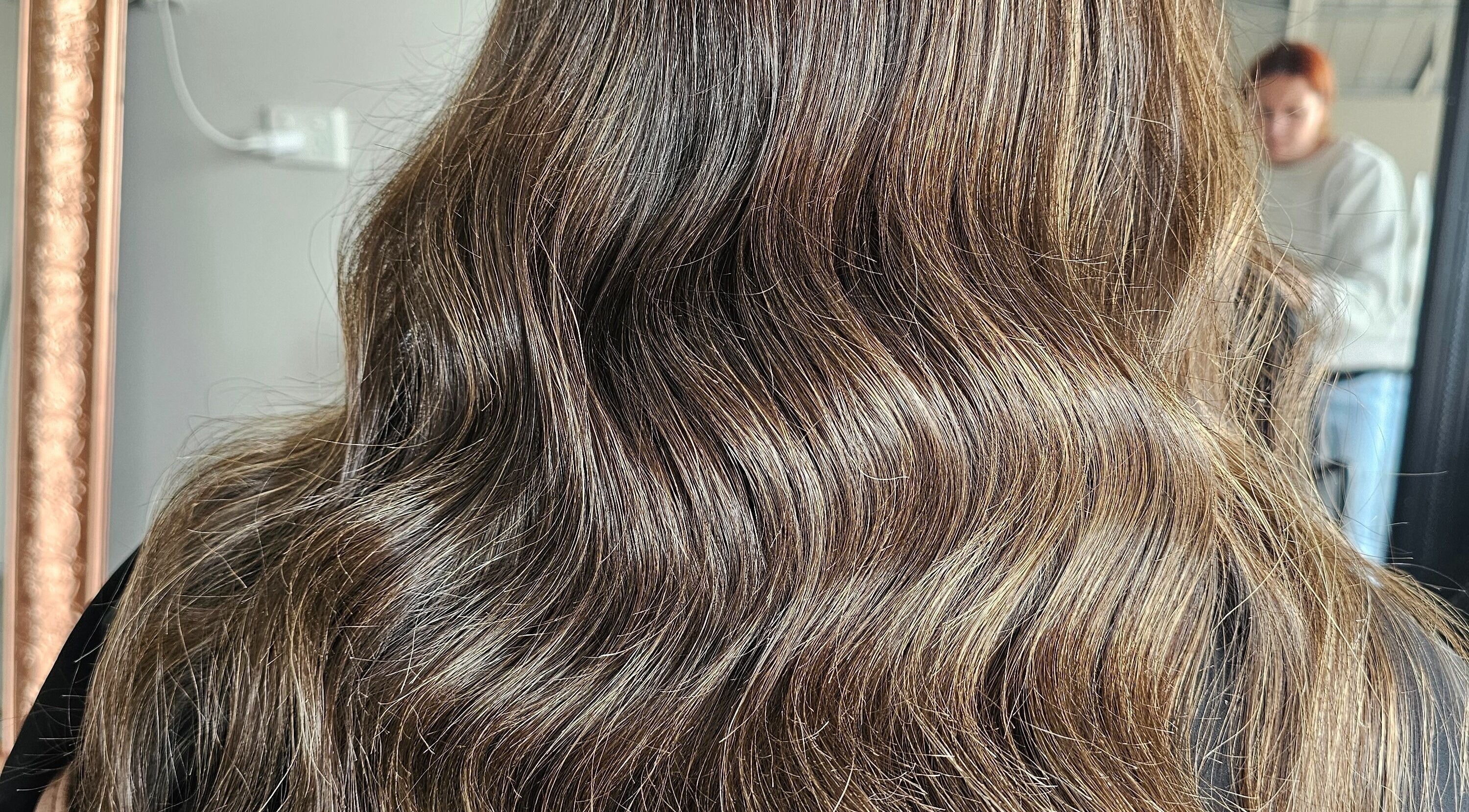 Glossy brunette waves styled at Tease by Jess in Mildura, Victoria, AU showcasing smooth, healthy hair.