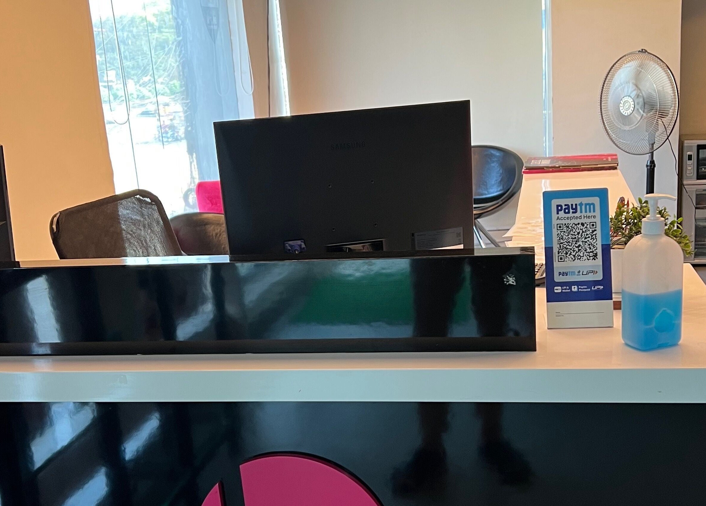 Reception desk at Lakme Salon Kompally, Hyderabad, Telangana, IN with payment options displayed.