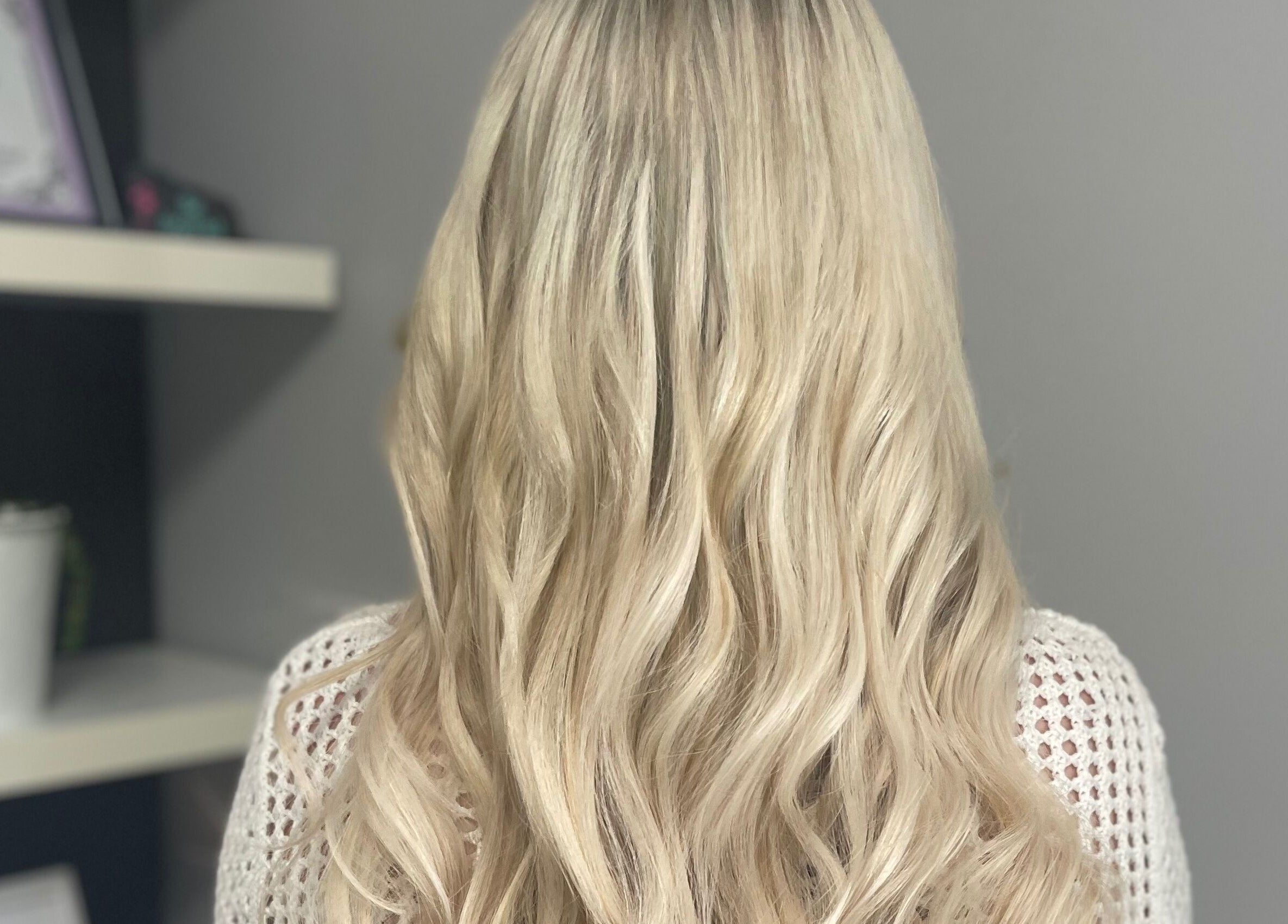 Blonde hair styled in waves at Orillia & Area Luxury Extension Beauty Bar, Orillia, Ontario, CA.