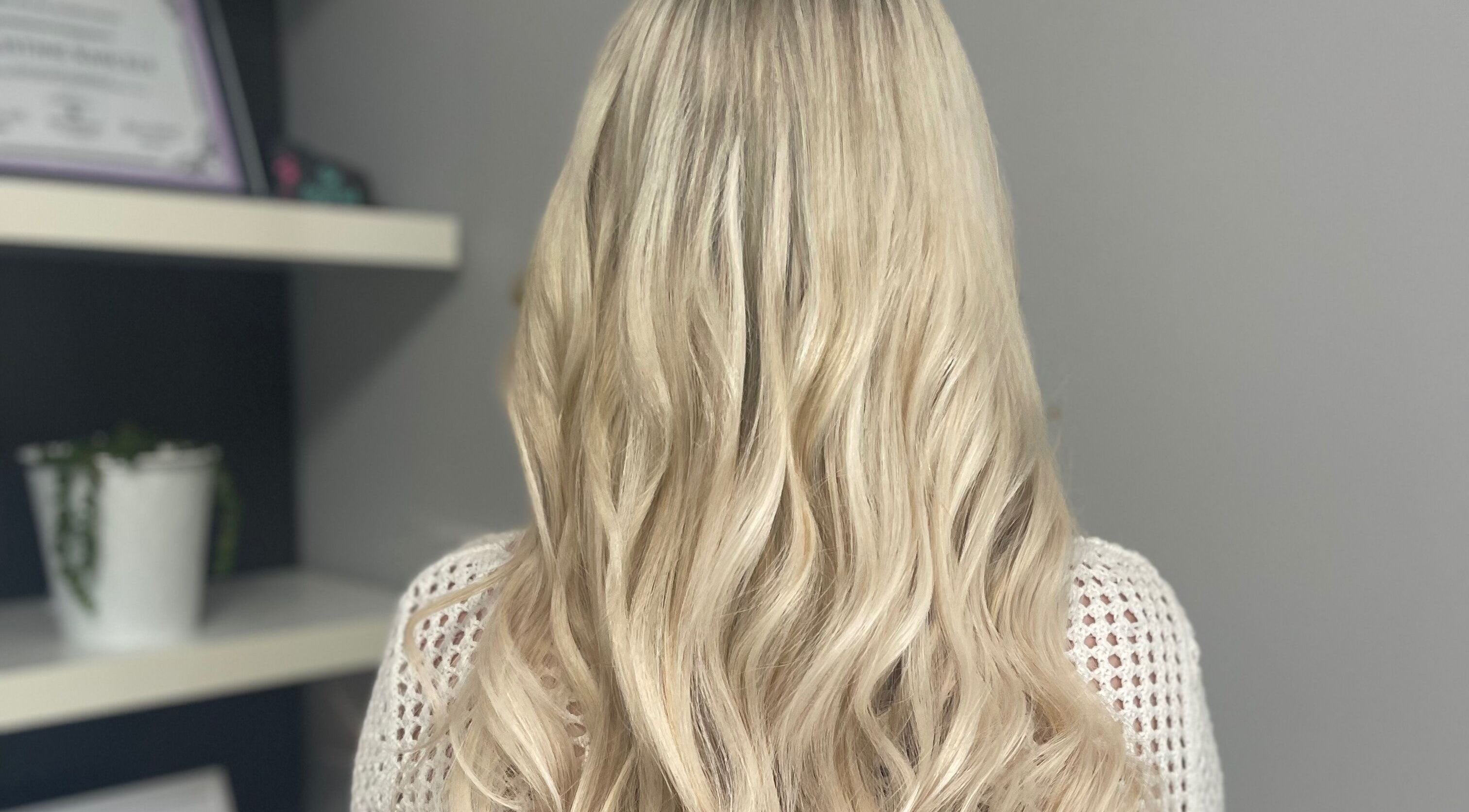 Blonde hair styled in waves at Orillia & Area Luxury Extension Beauty Bar, Orillia, Ontario, CA.
