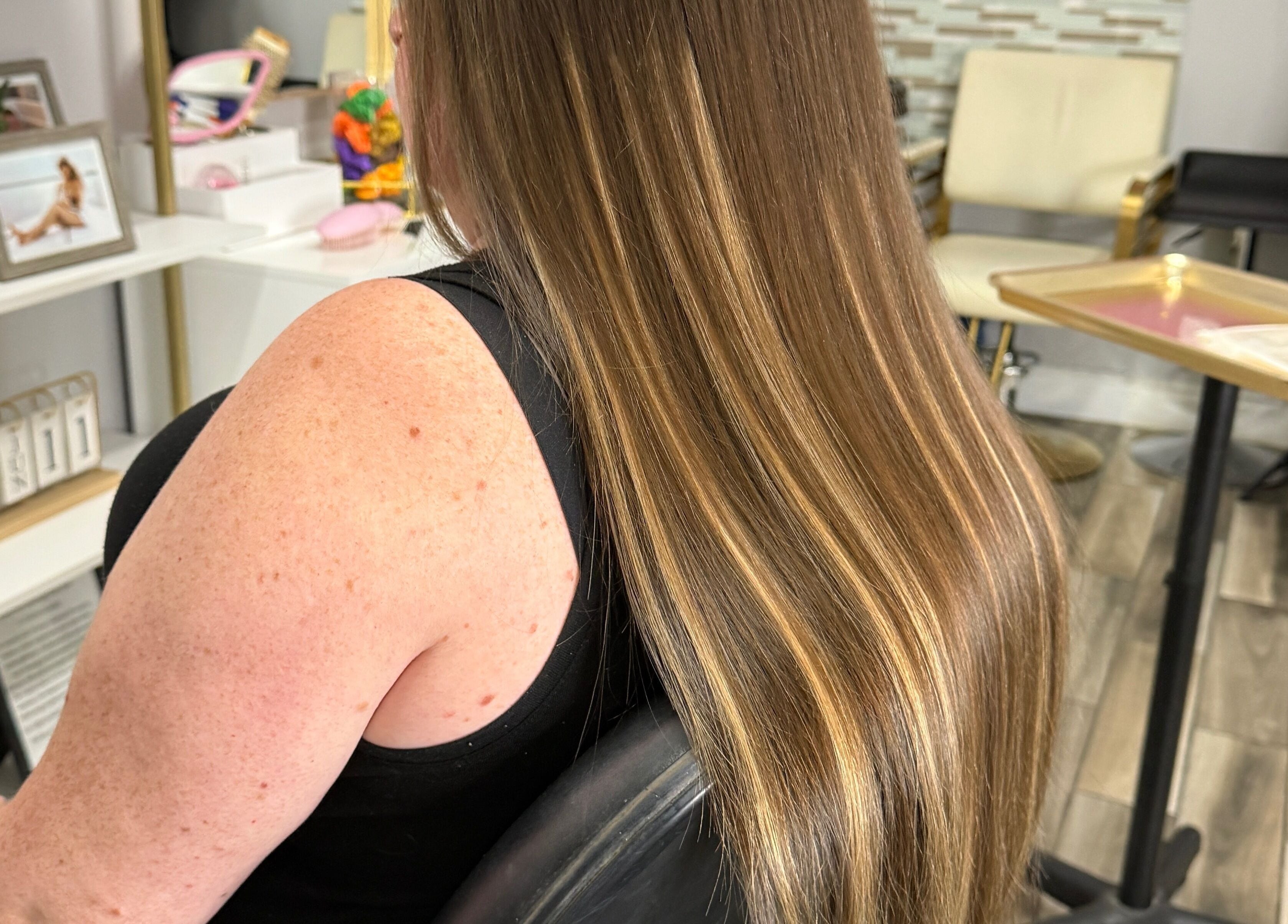 Smooth, shiny hair transformation at Orillia & Area Luxury Extension Beauty Bar in Orillia, Ontario, CA.
