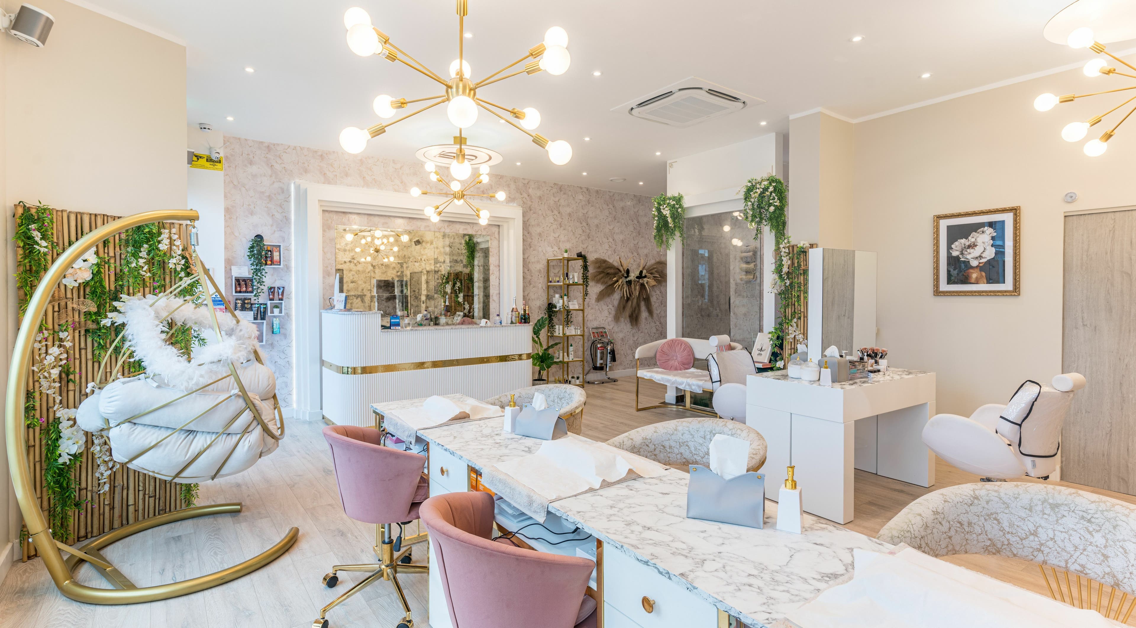 Elegant interior of Temptation Beauty London, London, England, GB, showcasing luxury salon seating and decor.