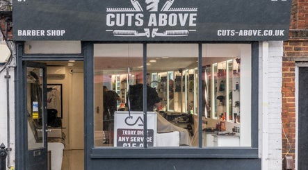 Front view of Grays Grooming For Men in Ewell, England, GB, showing stylish barbershop interior.