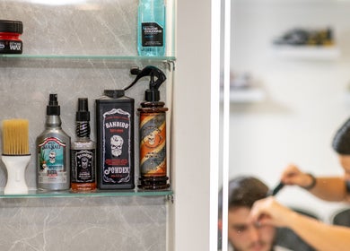 Barber tools and products at Grays Grooming For Men, Ewell, England, GB, showcasing a classic grooming setup.