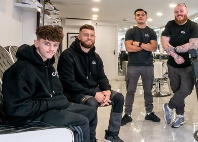 The team at Grays Grooming For Men in Ewell, England, GB, ready to serve clients with expertise and style.