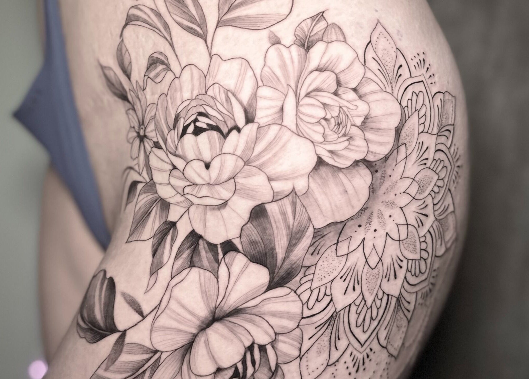 Intricate floral tattoo design at Nataly at Meadow & Charm - Council Bluffs, Iowa, US.