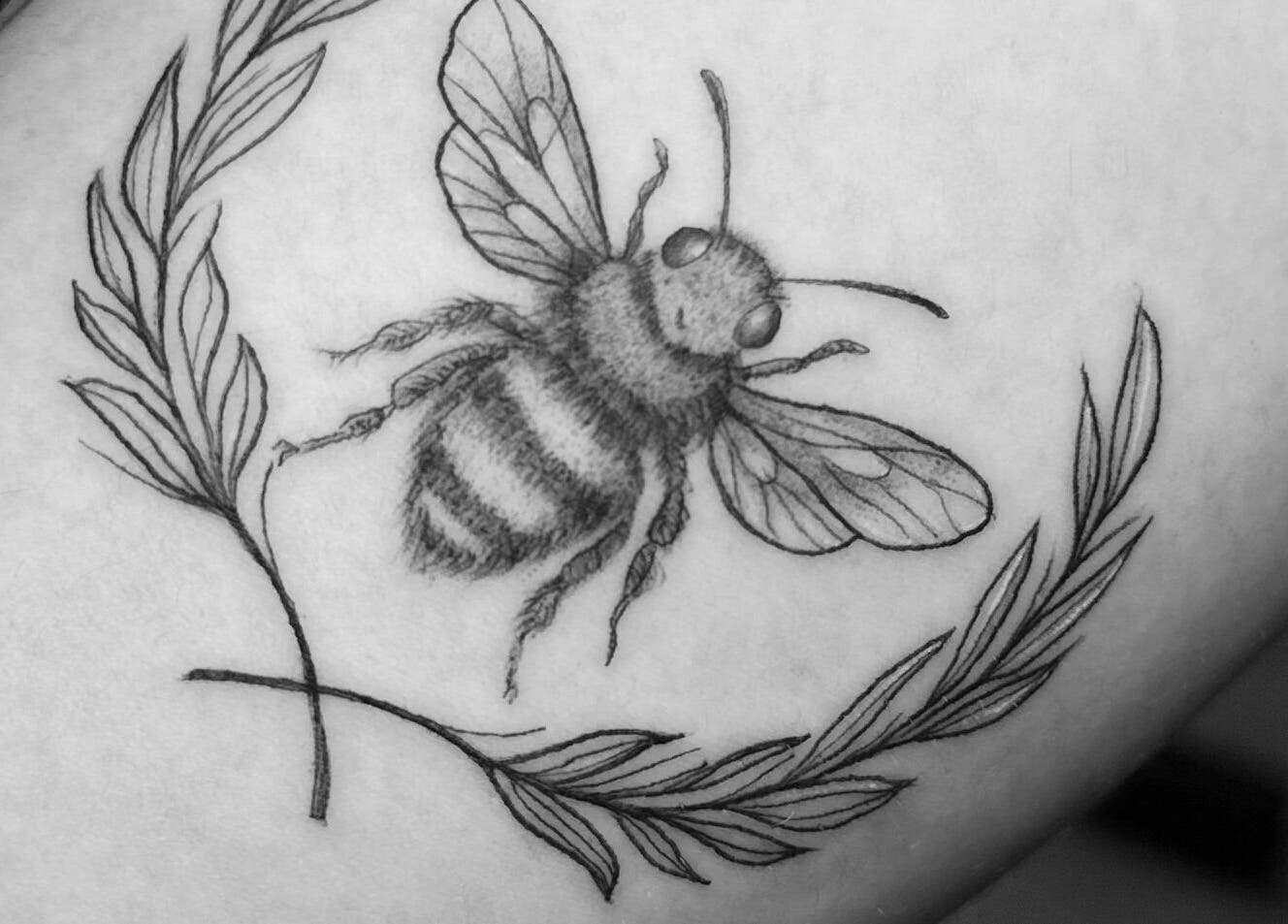 Detailed bee tattoo at Nataly at Meadow & Charm - Council Bluffs, Council Bluffs, Iowa, US.
