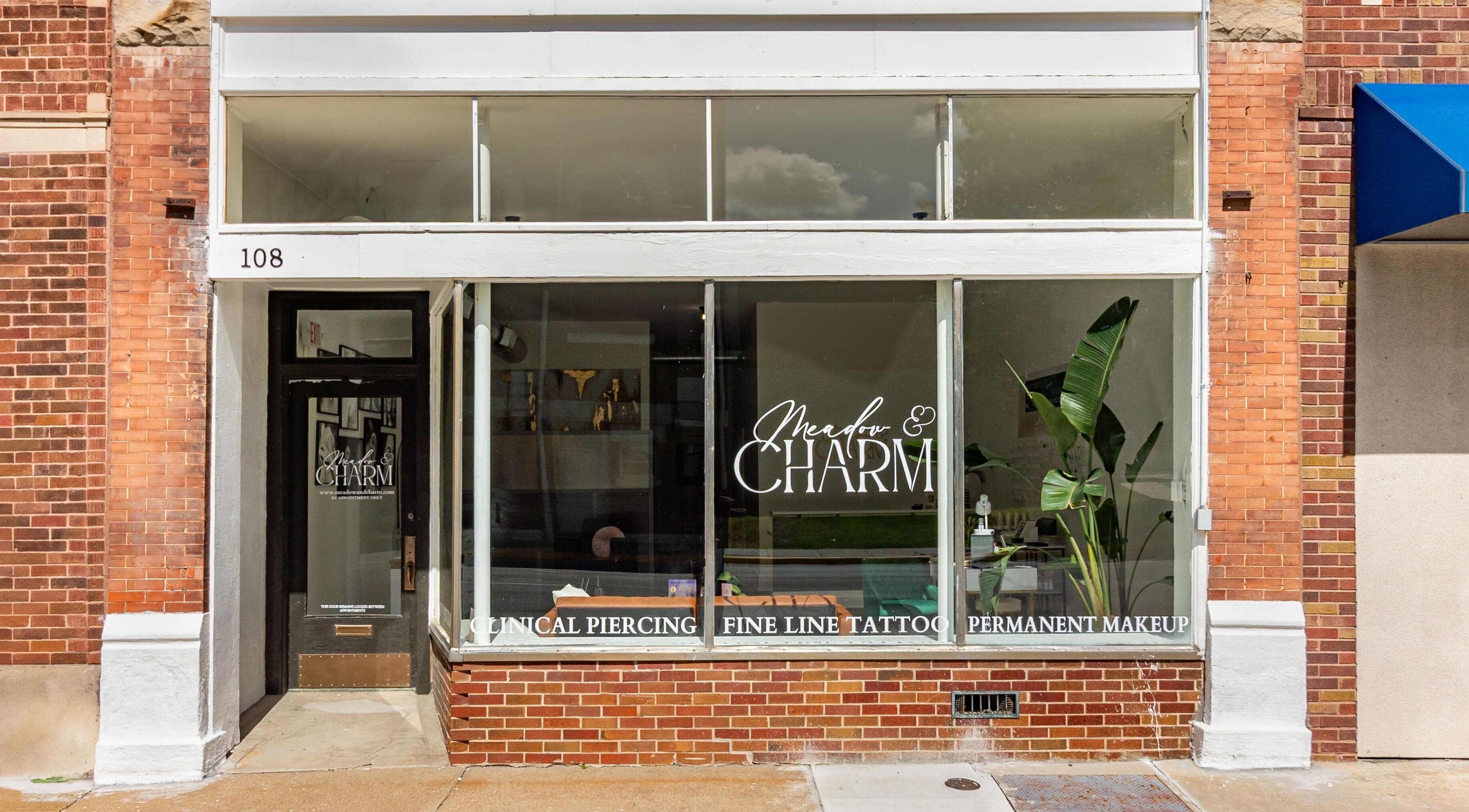 Exterior of Meadow & Charm - NEW LOCATION COUNCIL BLUFFS in Council Bluffs, Iowa, US, showcasing window signage.