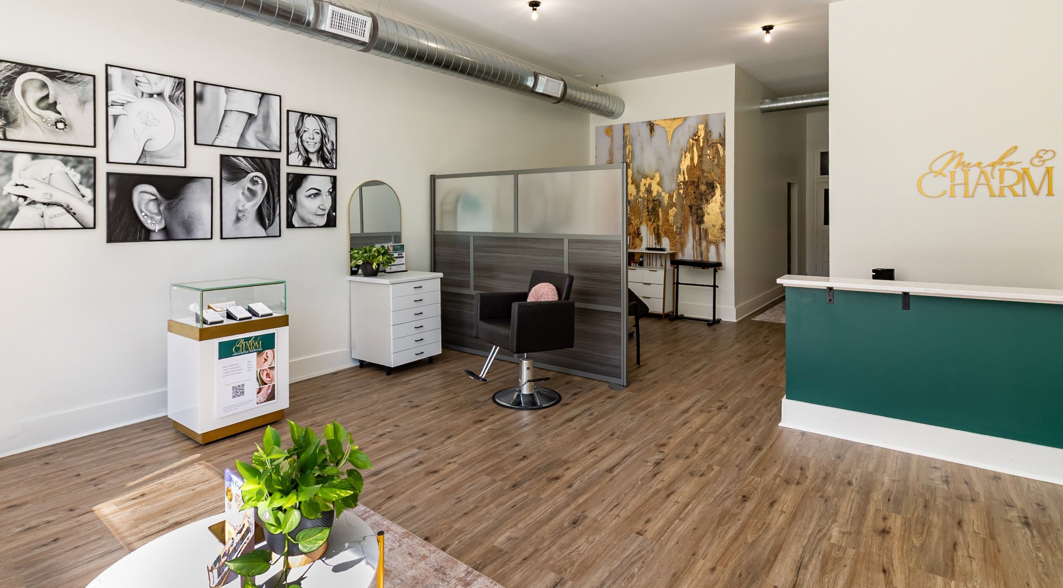 Stylish interior of Meadow & Charm - Council Bluffs in Iowa, US, featuring modern decor and seating area.