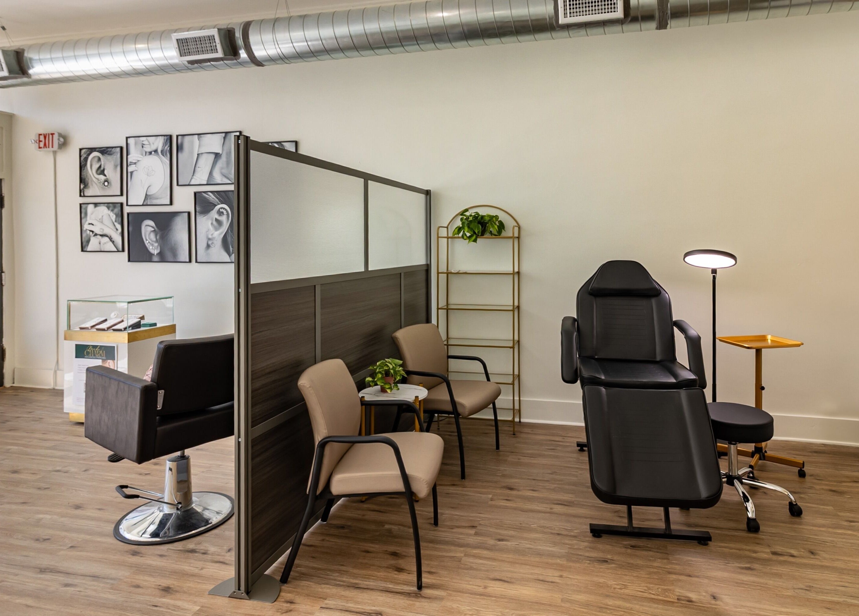Modern salon interior at Meadow & Charm - Council Bluffs, Council Bluffs, Iowa, US featuring stylish seating.
