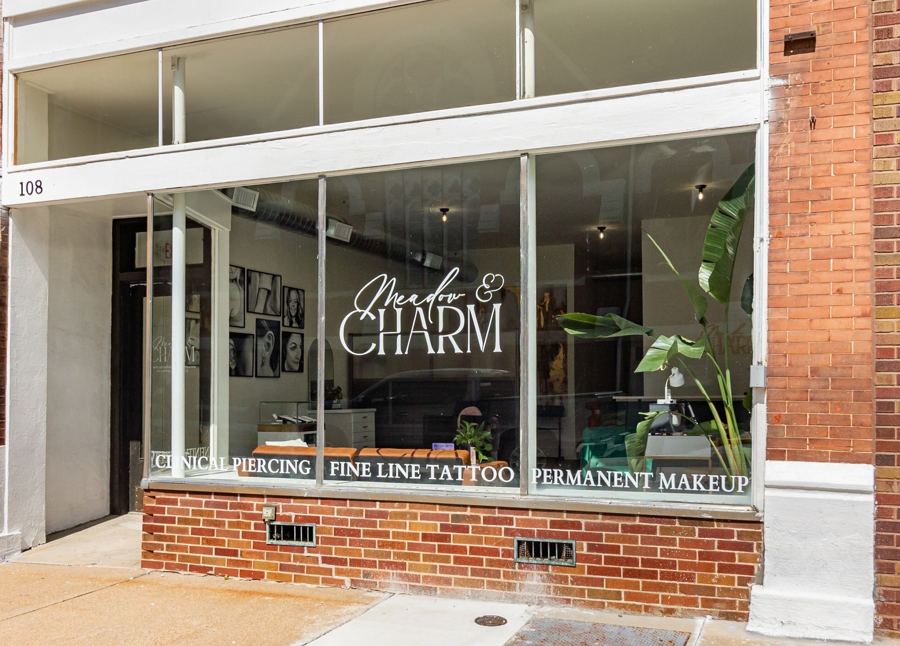 Exterior of Meadow & Charm - Council Bluffs in Council Bluffs, Iowa, US showcasing modern glass storefront.