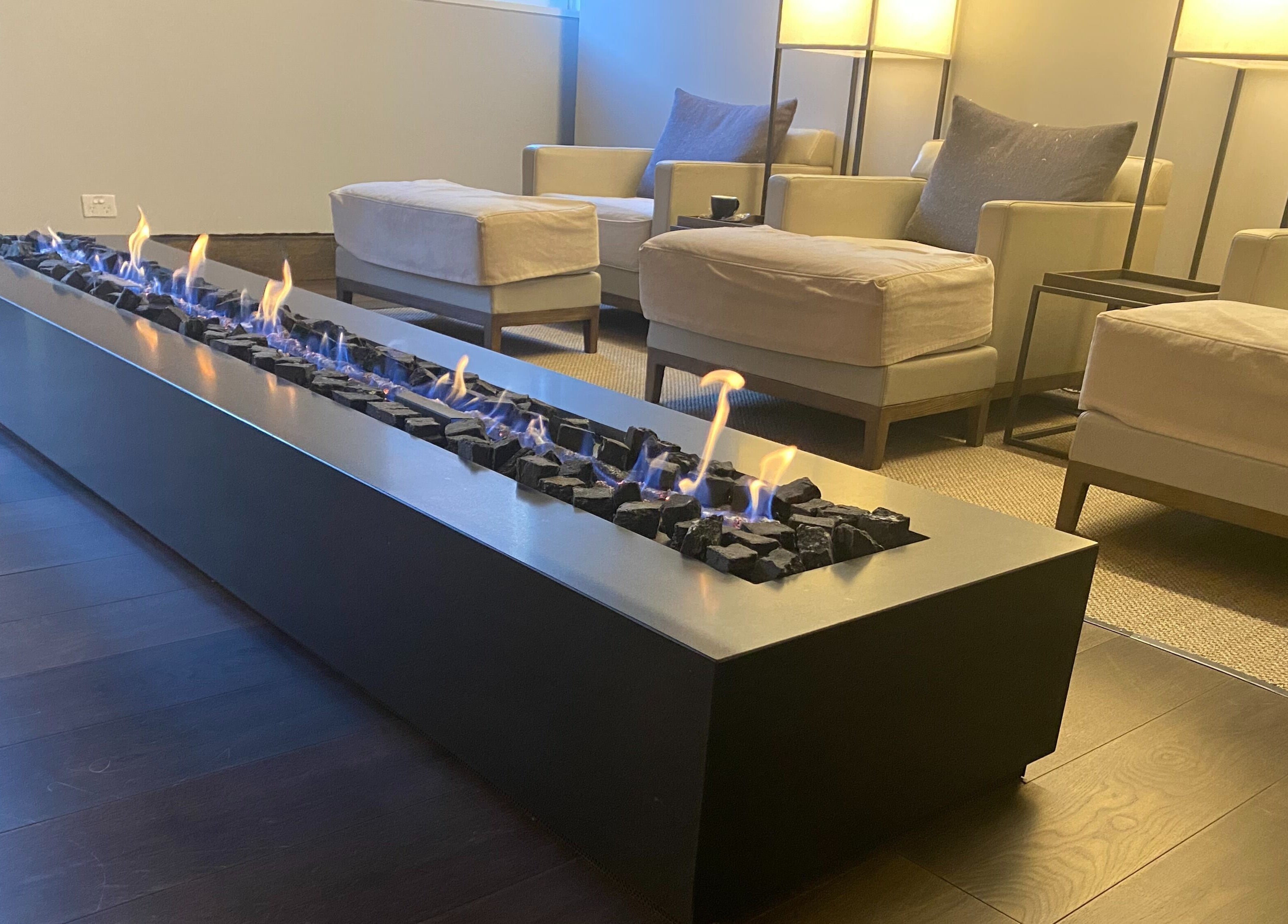 Elegant lounge with modern fireplace at Hale Spa, Barton, Australian Capital Territory, AU.